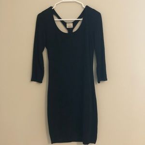 Black fitted mini dress with back detail